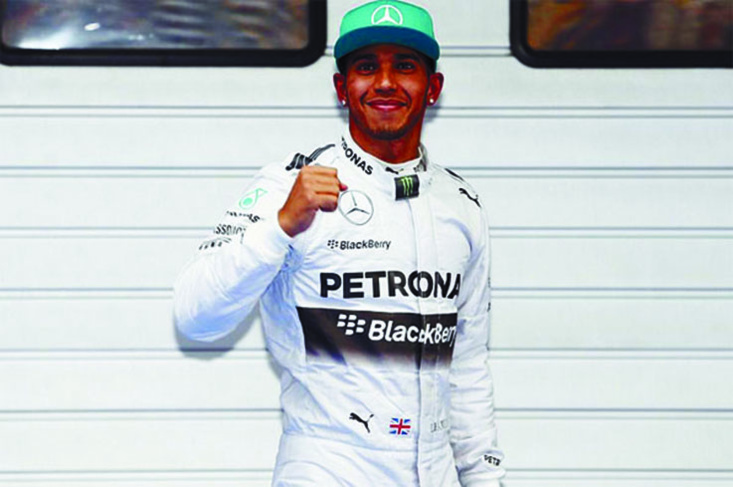 Top 20 des sportifs les mieux payés en 2014  : Lewis Hamilton Royaume-Uni (course automobile)