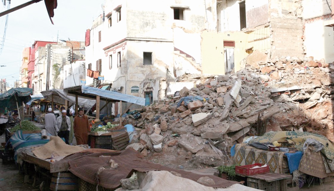 Abris de fortune et maisons menaçant ruine