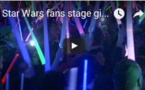 Star Wars fans stage giant lightsaber battle
