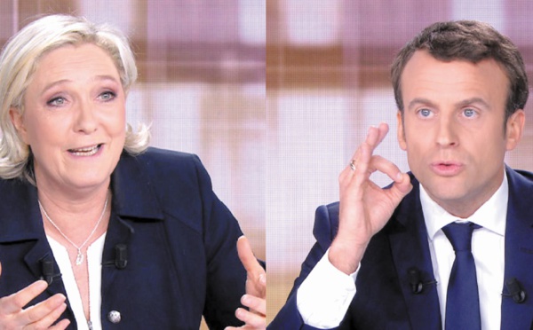 Macron donné vainqueur d'un débat houleux avec Le Pen